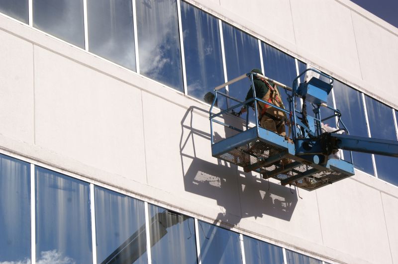 High-rise window repair work in progress